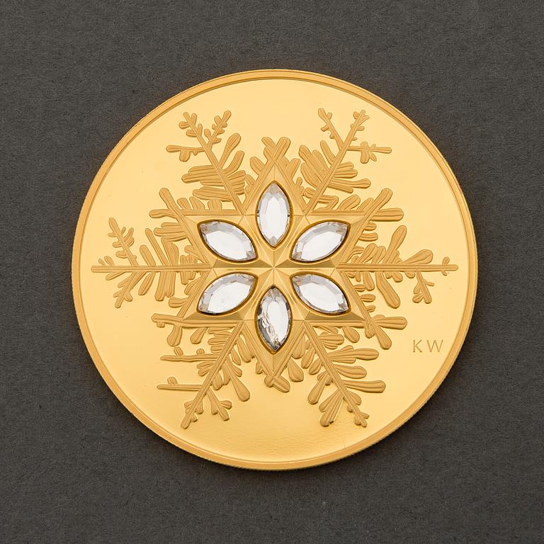 A Canadian 'Crystal Snowflake' 300 Dollar jubilee gold coin.