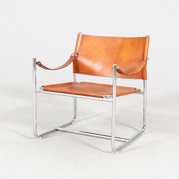 Karin Mobring, a late 20th century chrome and leather armchair from IKEA.