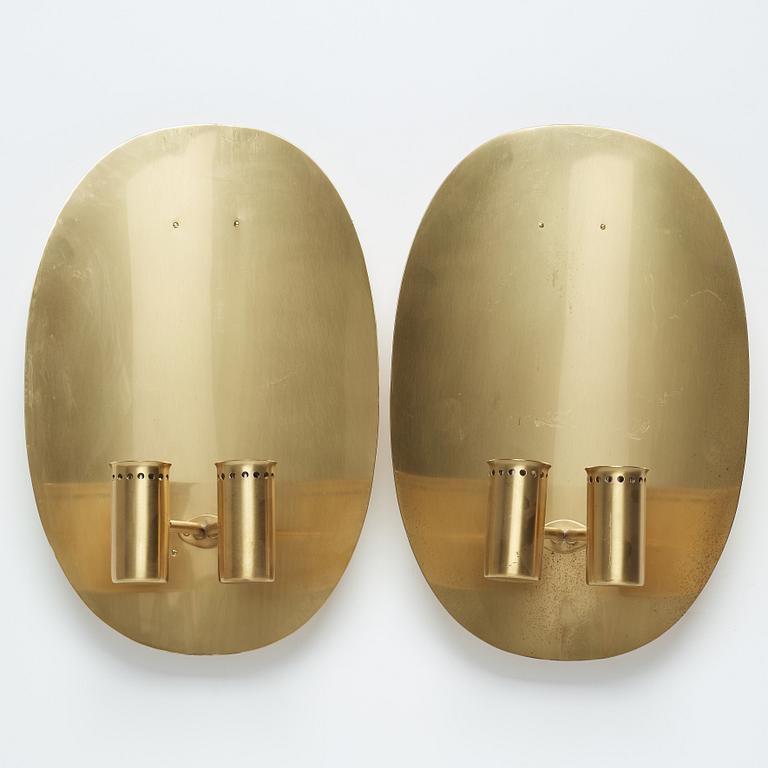 A pair of brass and glass wall sconces by Hans-Agne Jakobsson, Markaryd, second half of the 20th century.