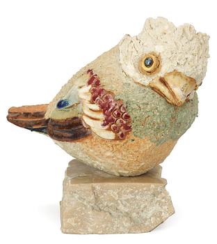 734. A Tyra Lundgren stoneware figure of a bird.