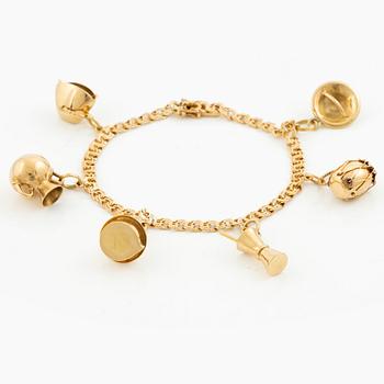 Bracelet, 18K gold bismarck link. With charms.