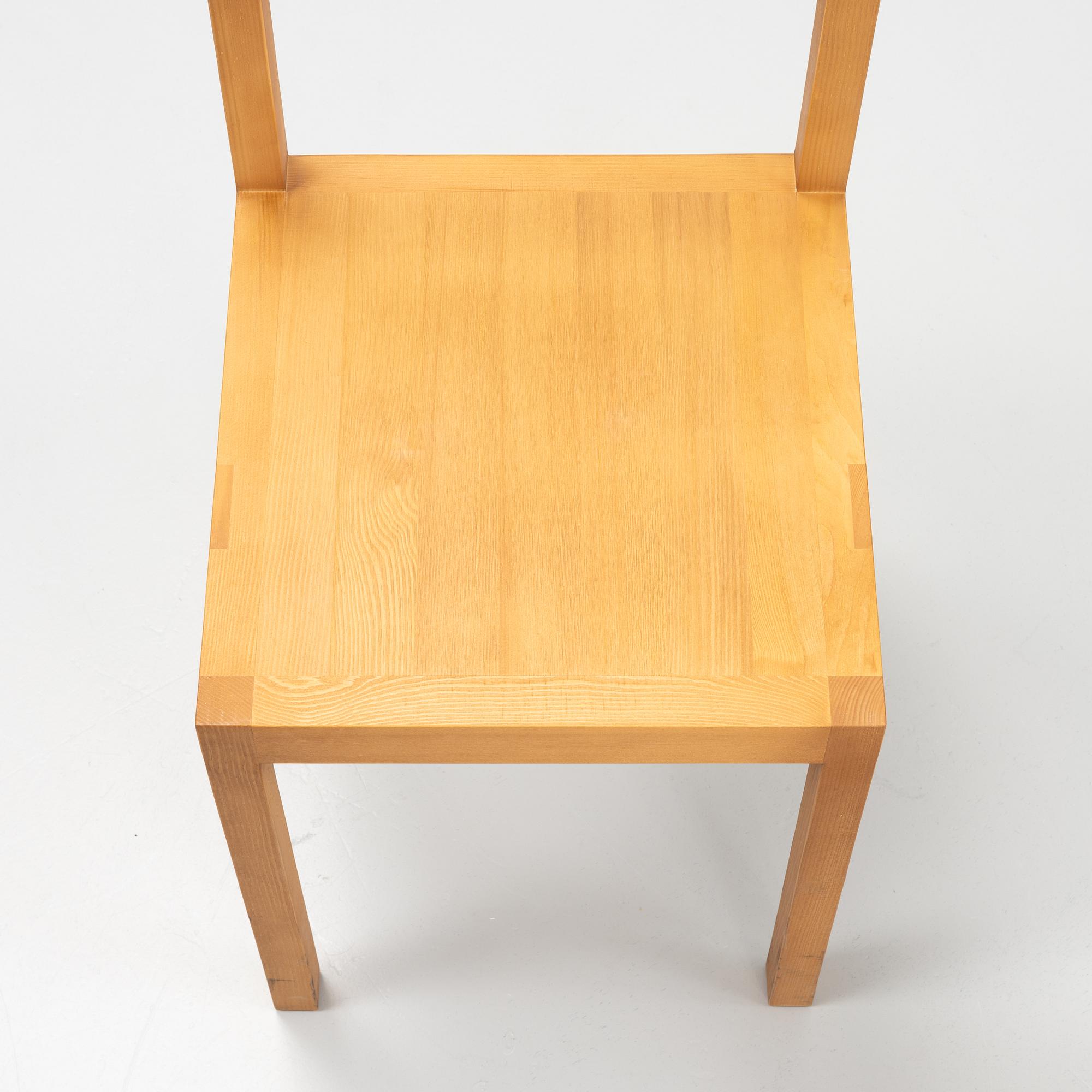 A set of eight signed stained pine 'Bracket Chairs' by Frederik Gustav for Frama, Copenhagen 2023.