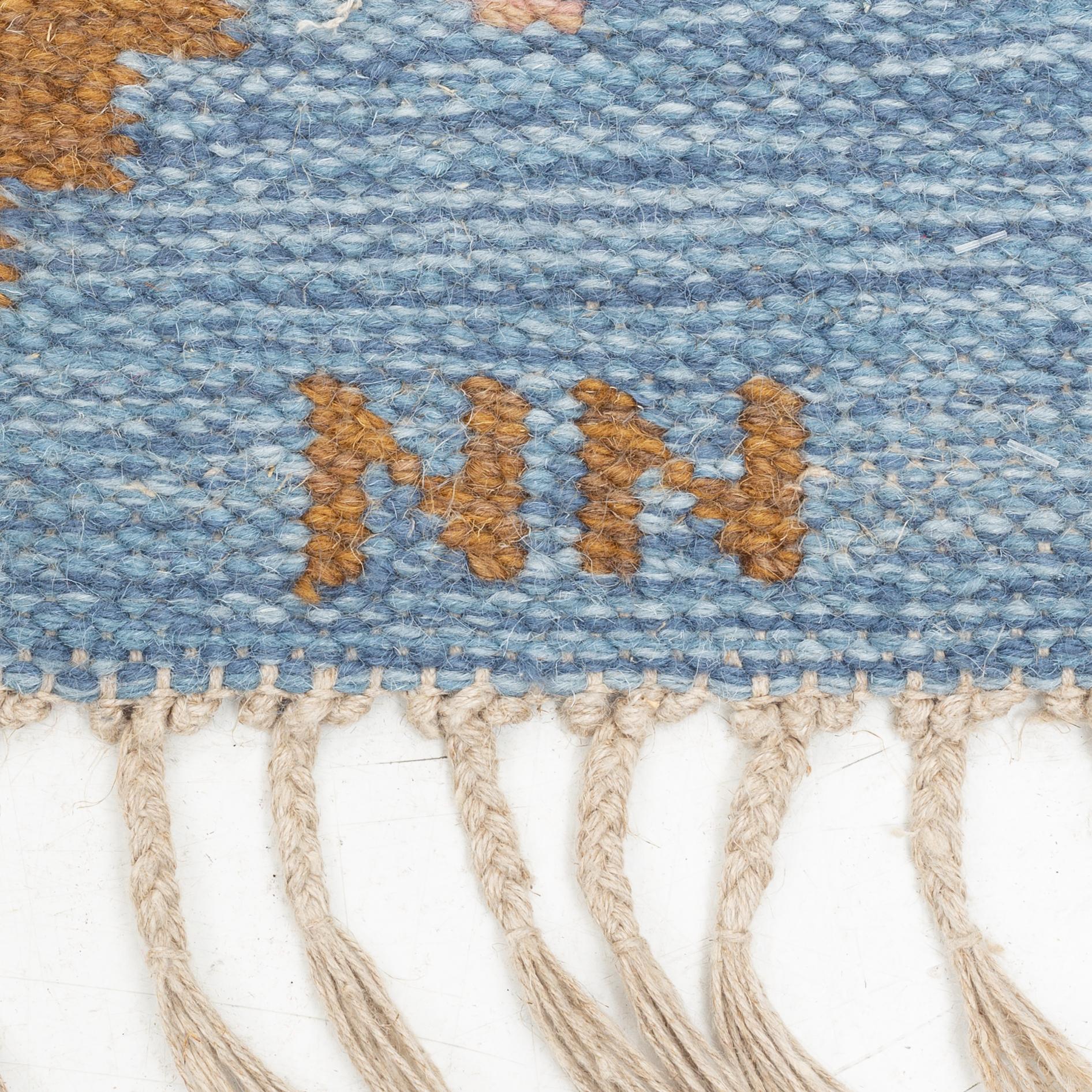 A flat weave carpet, Sweden, signed NN, ca 205 x 142 cm.