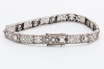 DIAMOND BRACELET, probably platinum, old and rose-cut diamonds approx 2 ct in total, 1 large stone not diamond.