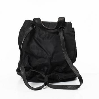 Prada, A nylon and leather backpack.
