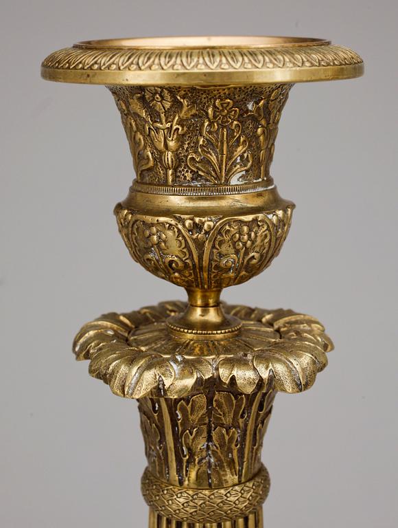 LJUSSTAKAR, ett par, brons, empirstil, 1800-tal.