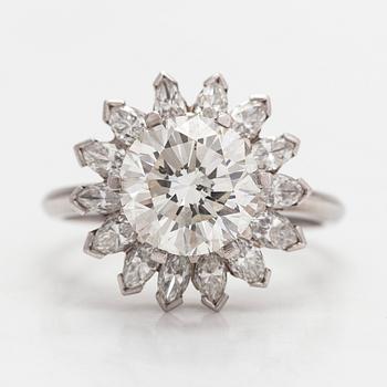 A platinum ring, with a brilliant-cut and marquise-cut diamonds totalling approx. 3.87 ct. With certificate.