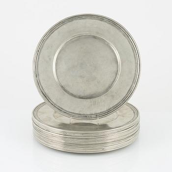 18 pewter cover plates, Cosa Tabellini, Italy.