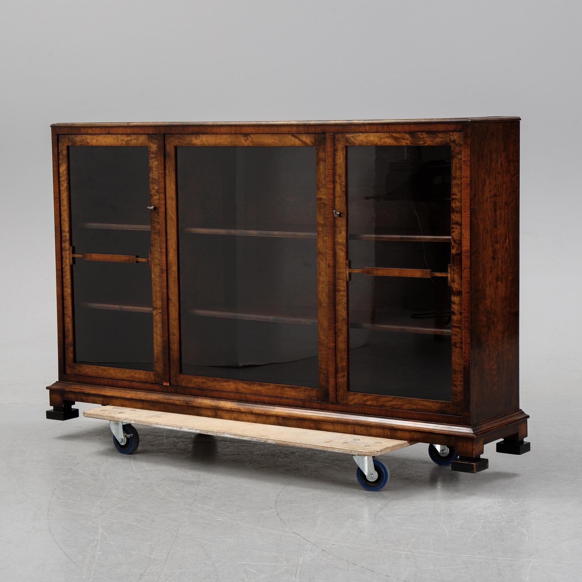 A birch display cabinet, Swedish Grace, first half of the 20th century.