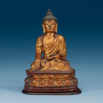 A partly gilt and lacquered figure of Buddha, Qing dynasty (1644-1912).