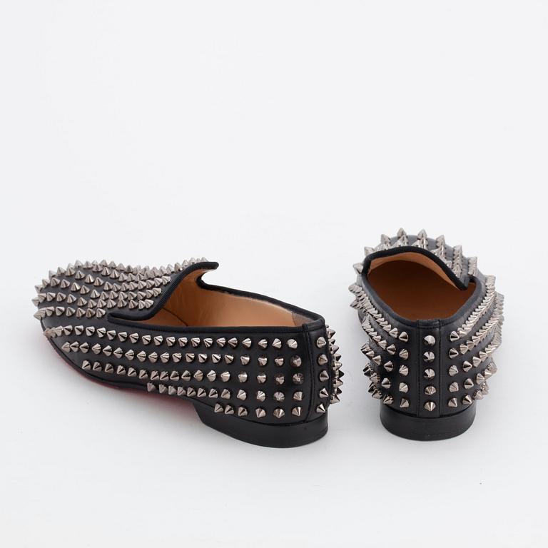 CHRISTIAN LOUBOUTIN, ett par loafers, "The Rolling Spikes", enligt märkning storlek 36, 5.