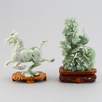 Two Chinese green stone figurines, 20th century.