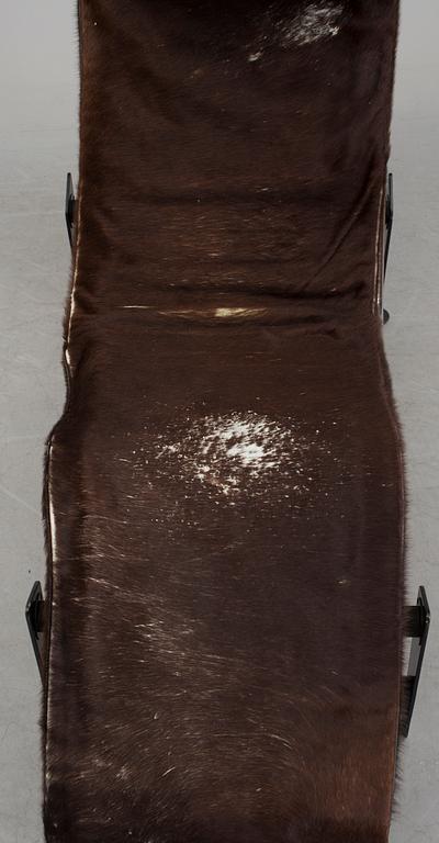 A LE CORBUSIER LC4 LOUNGECHAIR.