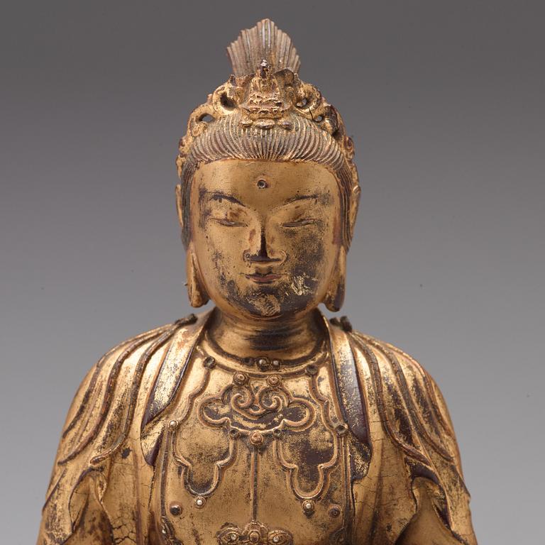 A lacquered wooden figure of Guanyin, 17th/18th Century.