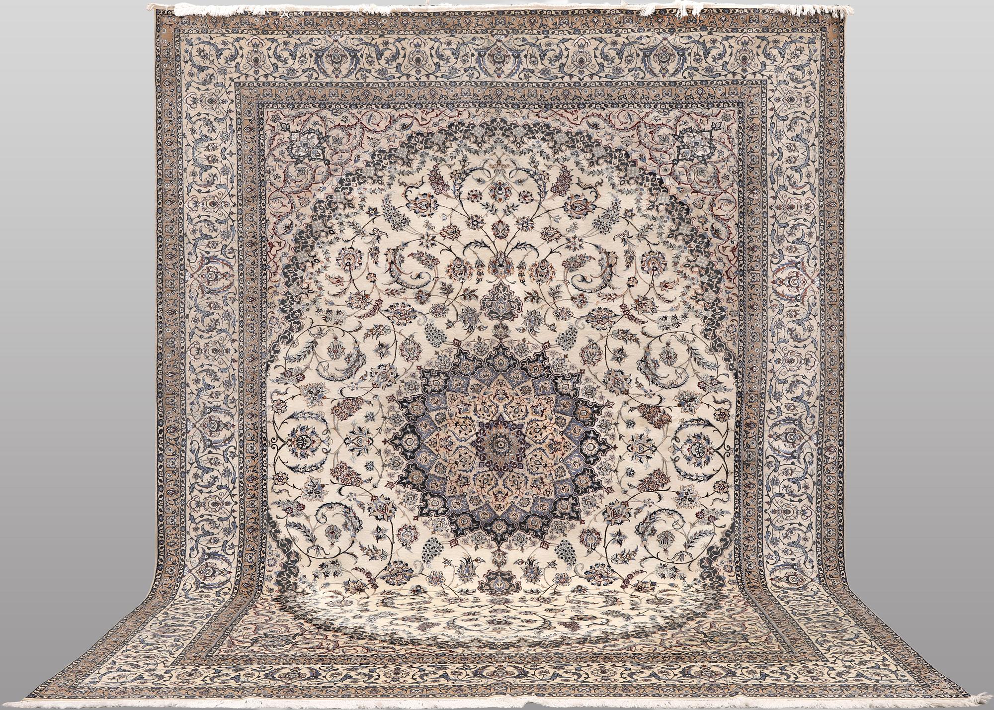 A Nain part silk carpet, 407 x 304 cm.
