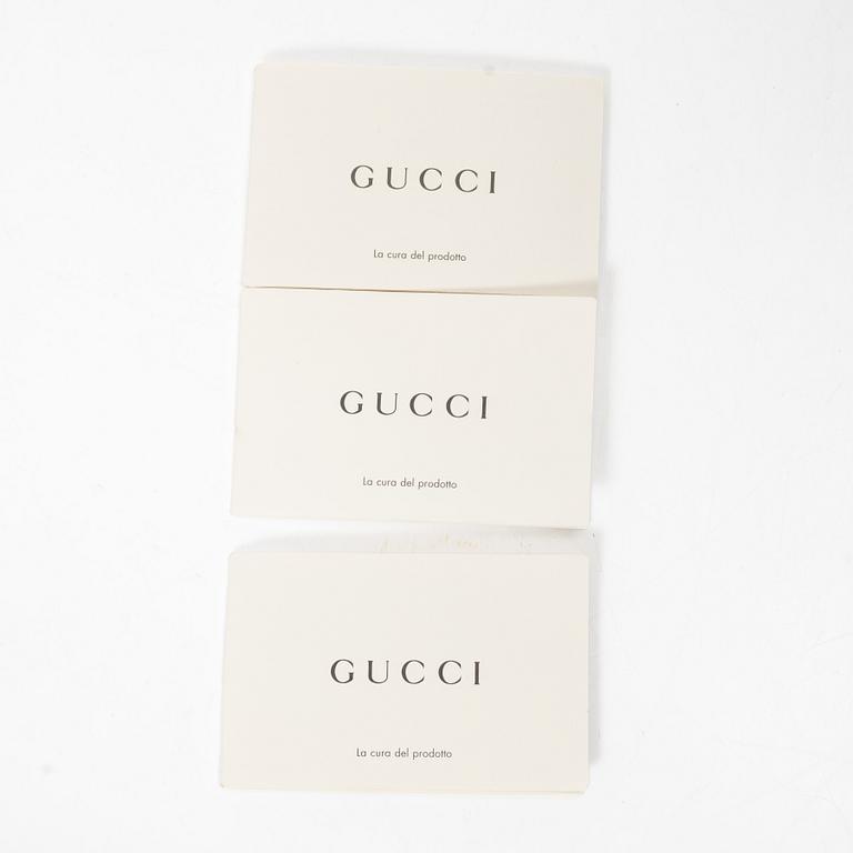 Gucci, a handbag.