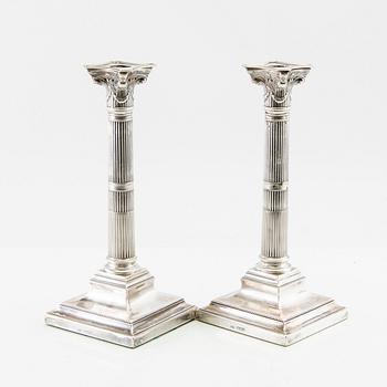 Silver candlesticks, a pair by Harrisson Brothers & Howson, Sheffield England 1893.