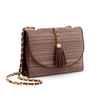 CHANEL, a brown canvs and leather crossbody bag.