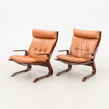 A pair of easy chairs from the second half of the 20th century.