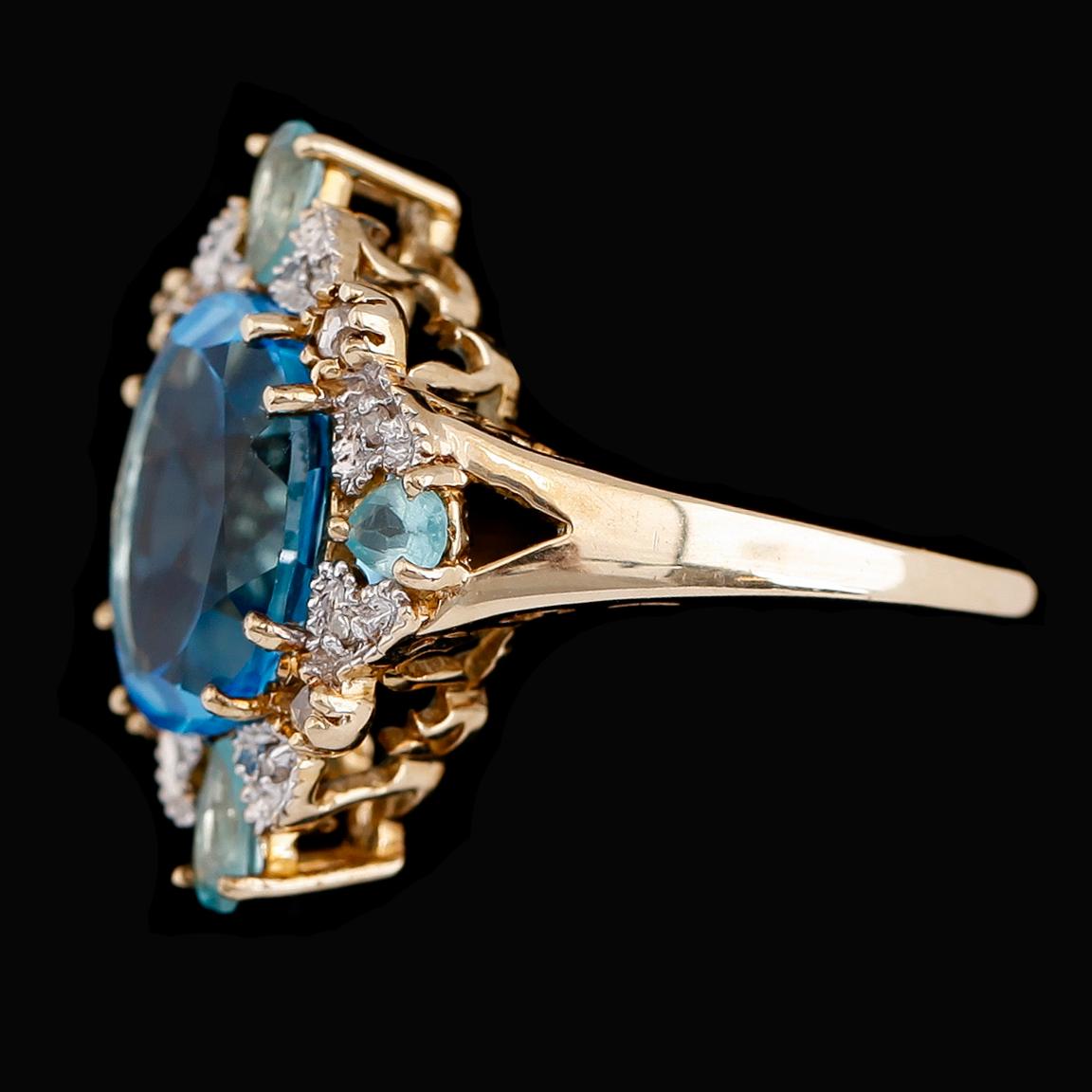 RING, 10 k guld, stenar bl a blå topas ca 5.06 ct och diamanter 0.14 ct.