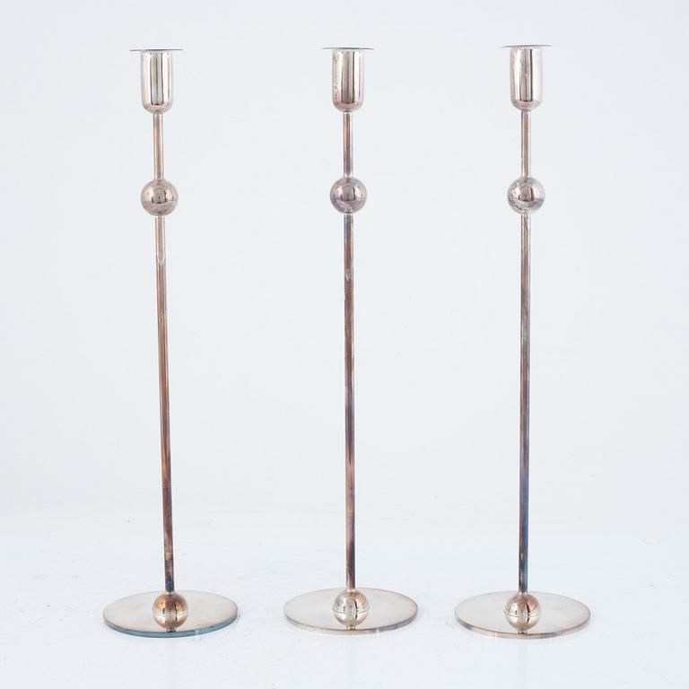 Estrid Ericson, a set of three 'Kulan' candlesticks, Firma Svenskt Tenn.