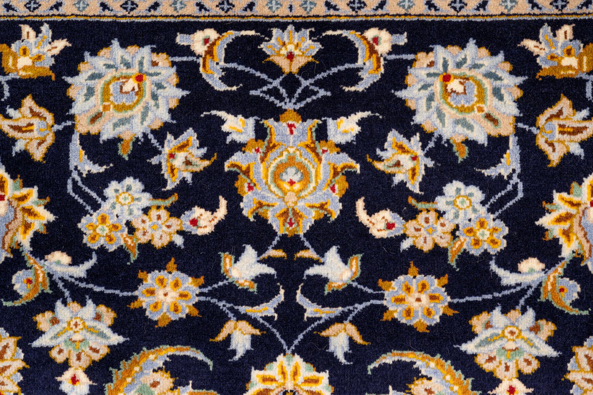A Keshan carpet, approx. 405 x 300 cm.