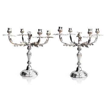 228. A pair of German 18th century silver candelabras, mark of C.C. Papcke, Stralsund.