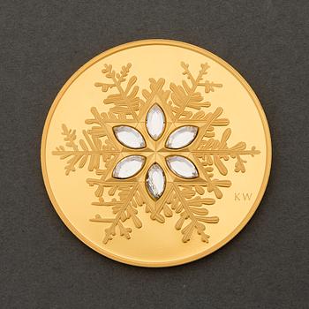 A Canadian 'Crystal Snowflake' 300 Dollar jubilee gold coin.