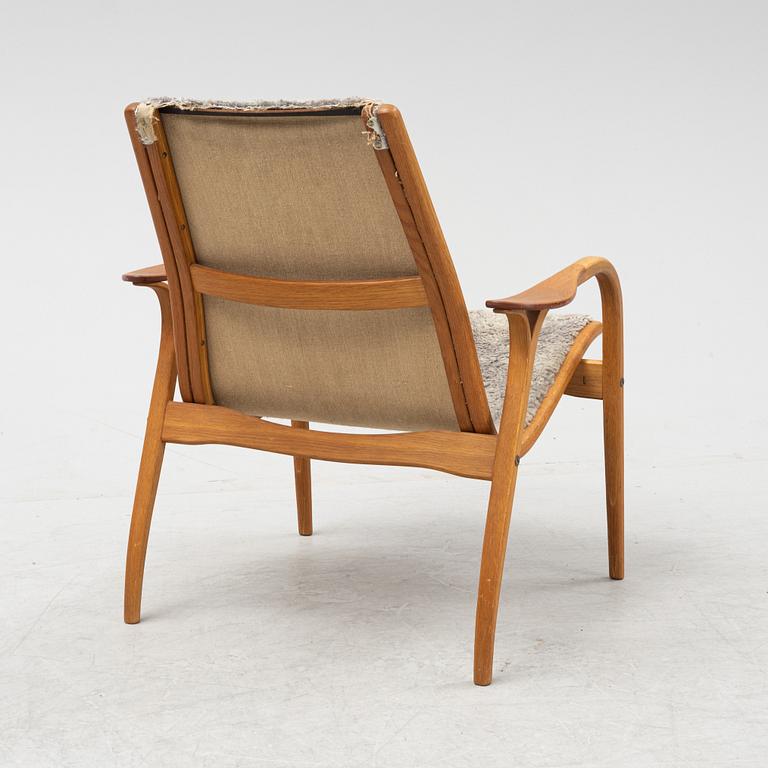 Yngve Ekström, a shearling 'Laminett' easy chair, Swedese.