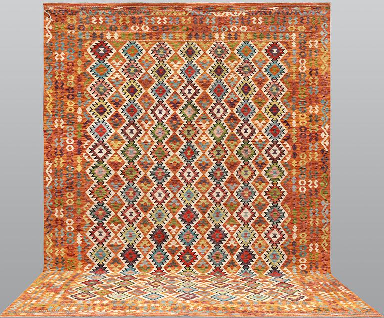 A Kilim carpet, c. 497 x 305 cm.