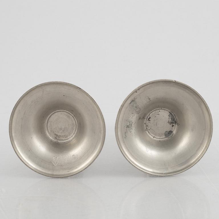 A pair of pewter candle sticks, model A702, Firma Svenskt Tenn, Sweden, 1928.