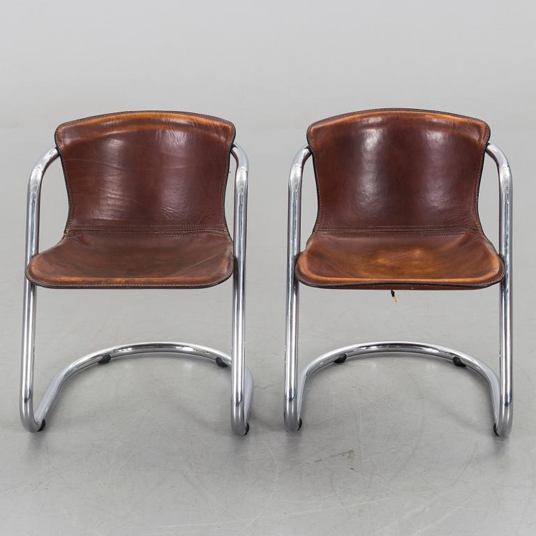 A pair of Willy Rizzo chairs.