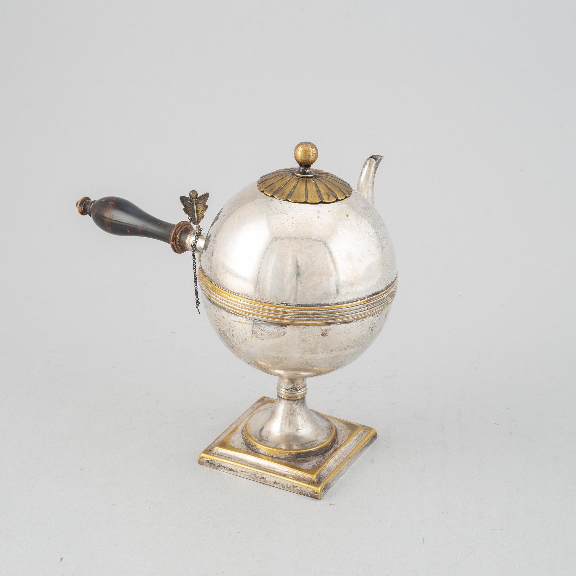 An Empire 19th century silvered brass teapot.