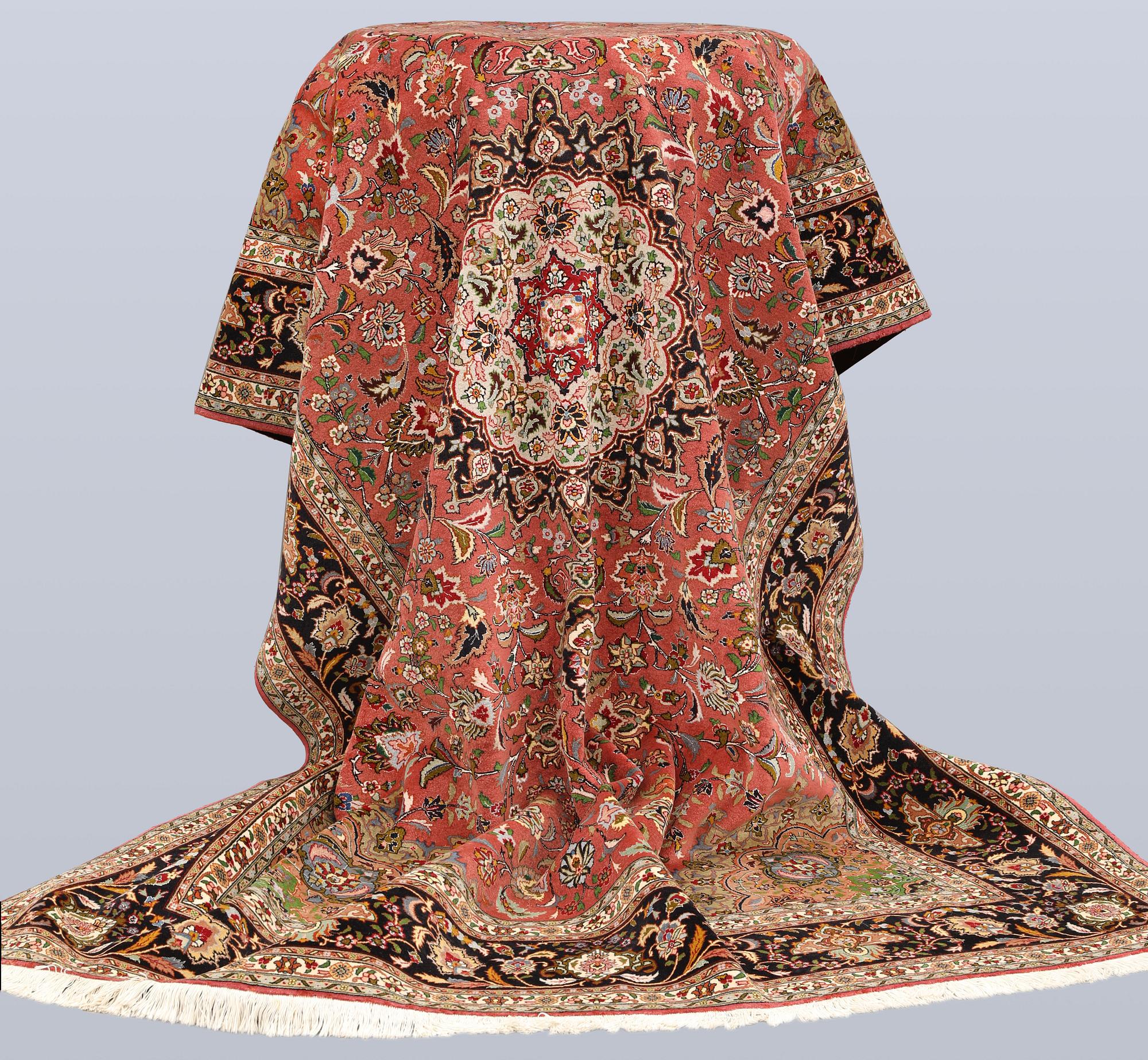 A part silk Tabriz carpet, approx. 50 Raj, 292 x 202 cm.