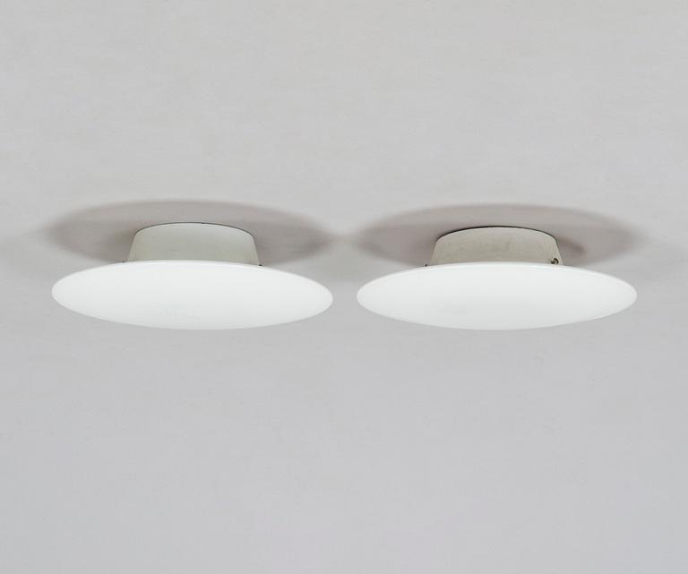 Arne Jacobsen, taklampor/ vägglampor, ett par, "AJ-Eklipta", Louis Poulsen, Danmark.