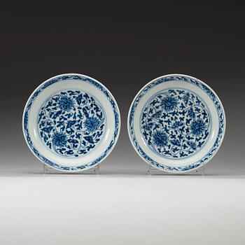 A pair of blue and white lotus dishes, Qing dynasty (1644-1912) with Kangxi six characters mark.