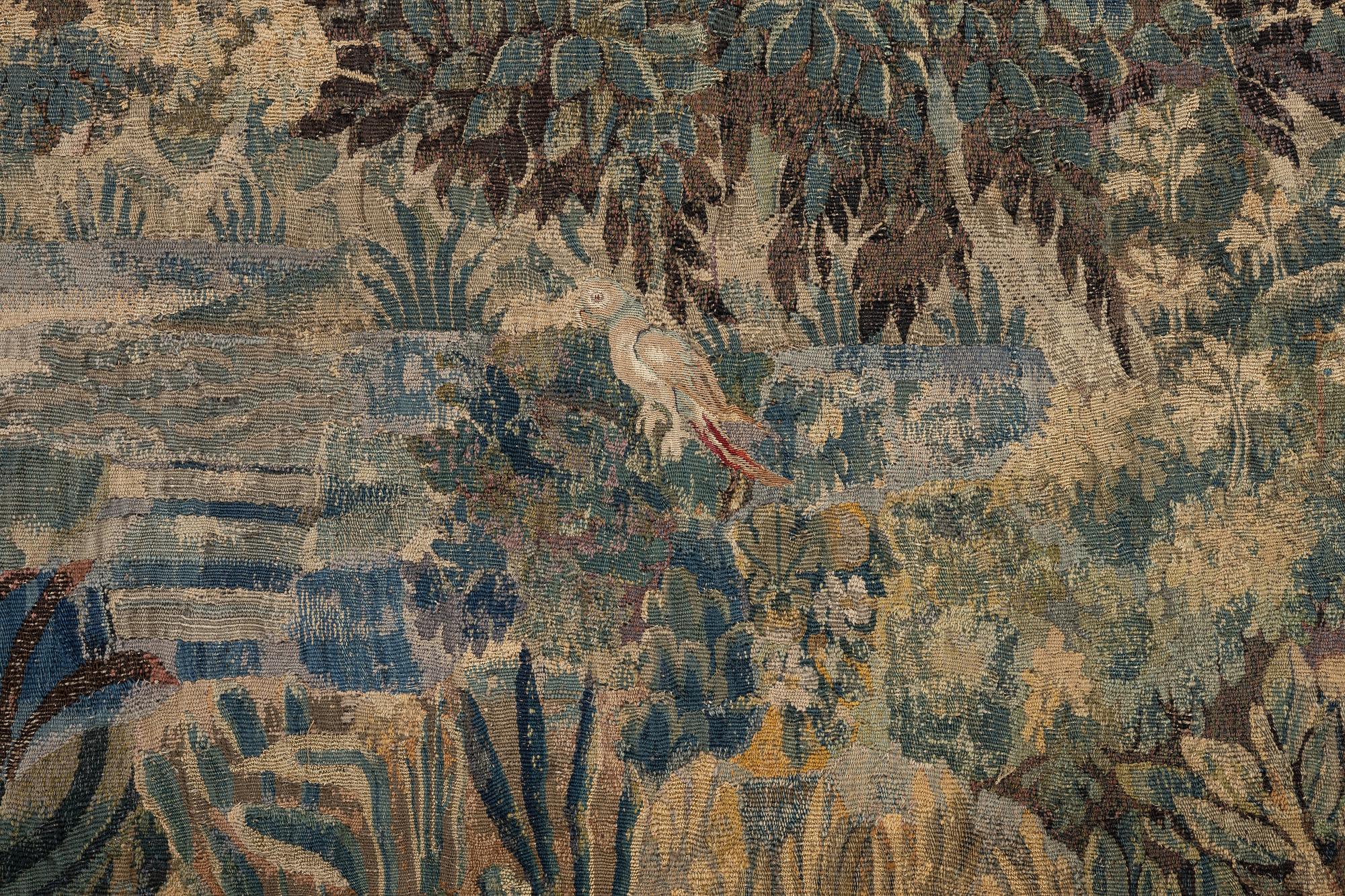 A flemish 'verdur' tapestry, c. 282 x 321 cm, 18 th century.