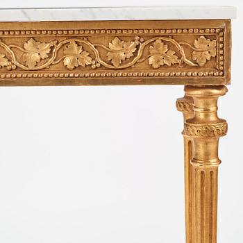 A late Gustavian carved giltwood and marble console table attributed to P. Ljung (1743-1819).