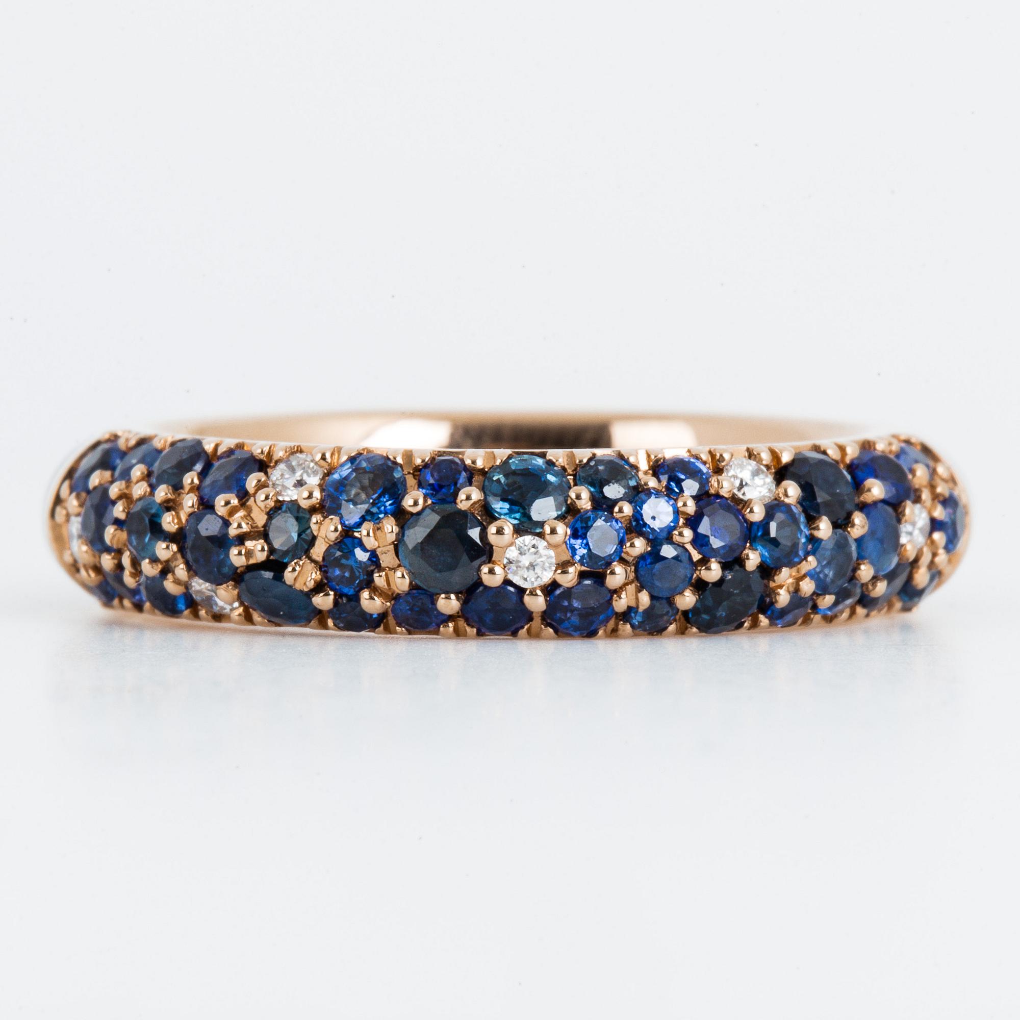 An enamel and brilliant cut diamond ring.