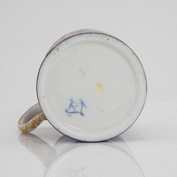 A Sèvres porcelain cup and sacuer, probably 1770's.