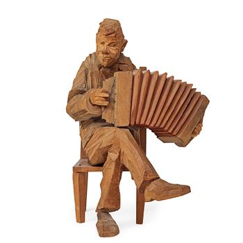 796. Axel Petersson Döderhultarn, Seated accordionist.