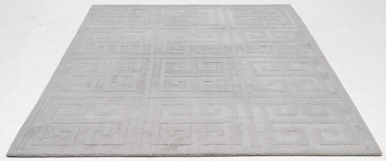A 'Cubes' carpet, Layered, c. 270 x 180 cm.
