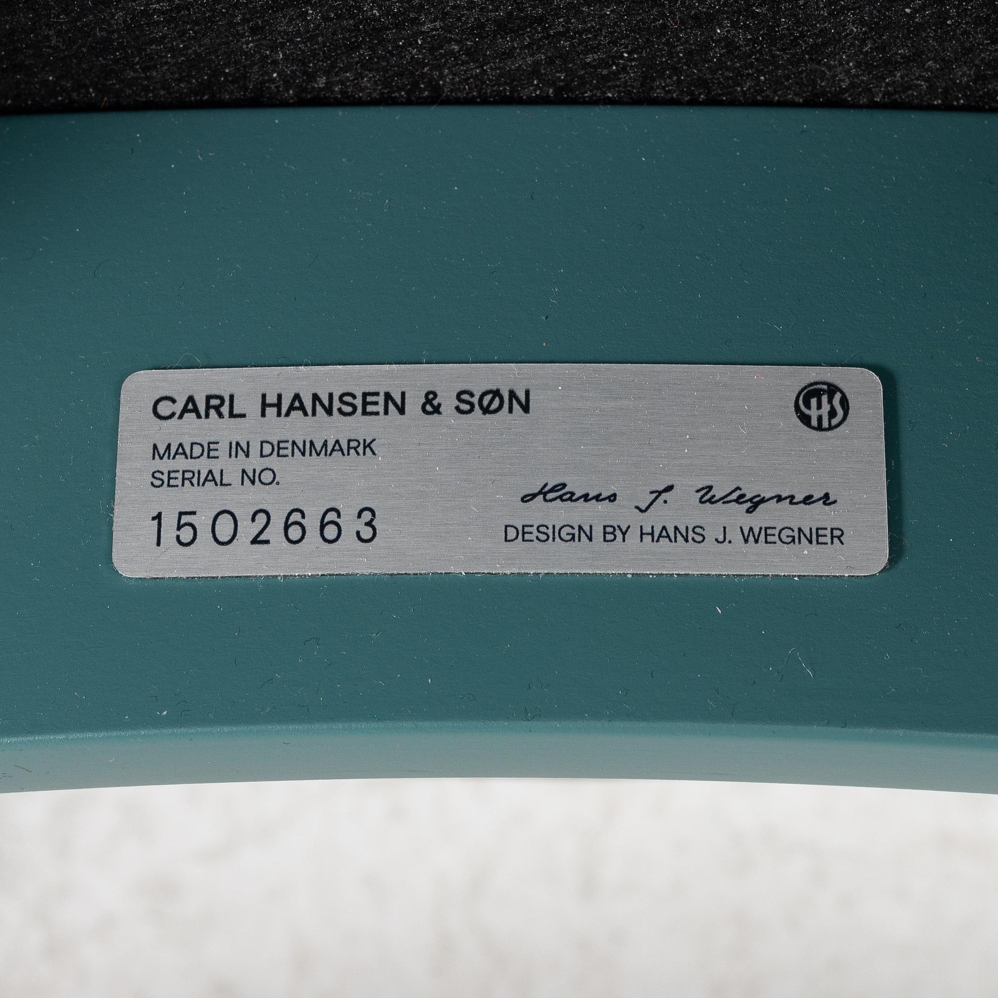 Hans J. Wegner, a set of three "CH-20" dining chairs, Carl Hansen & Son, Denmark 21st century.