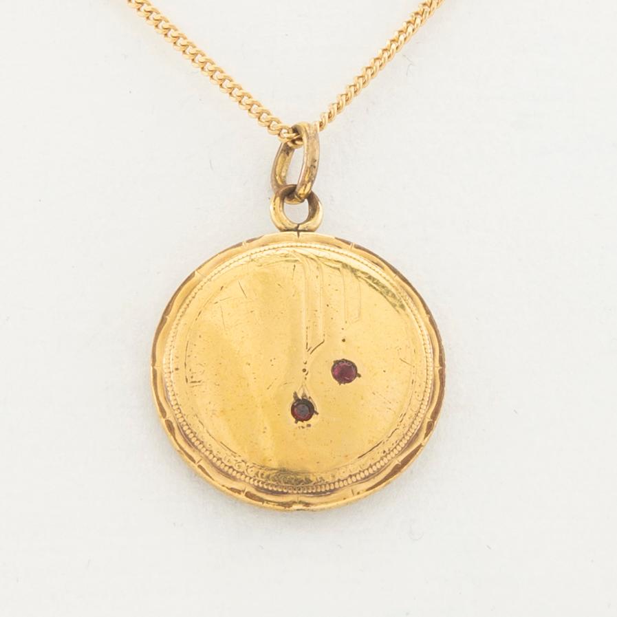 Halsband 18K guld med hänge av 8K guld.