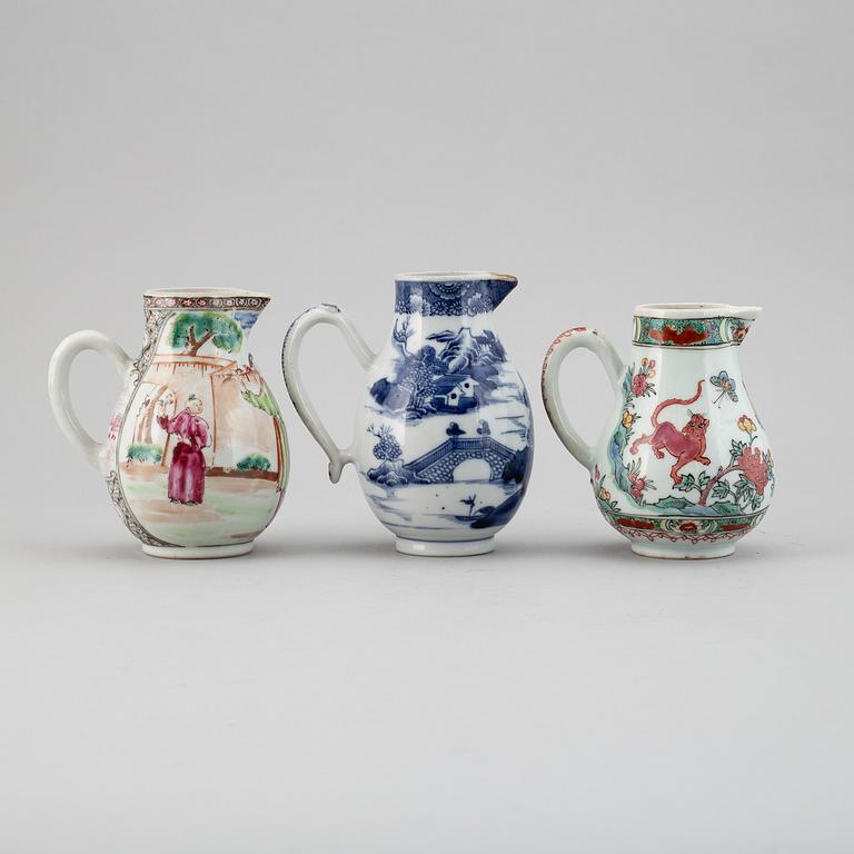 A group of three famille rose and blue and white jugs, Qing dynasty, Qianlong (1736-95).