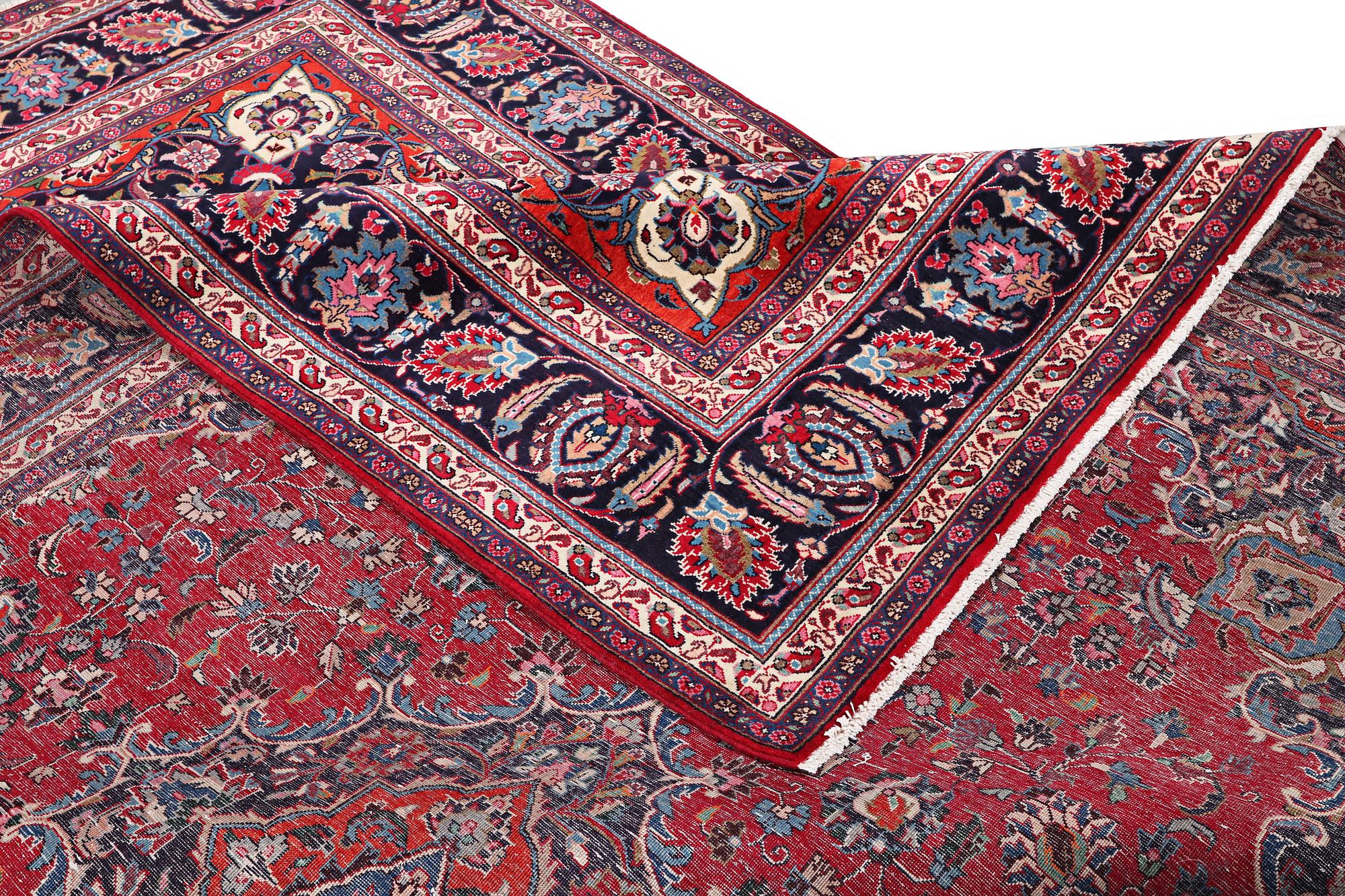 A Kashan carpet, c. 358 x 244 cm.