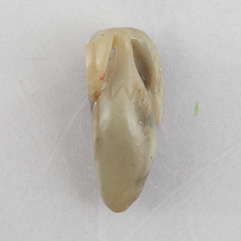 A group of three Chinese stone charms, 20th century.