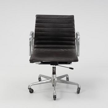 An EA 118 swivel office chair by  Charles and Ray Eames for Herman Miller, designed 1958.