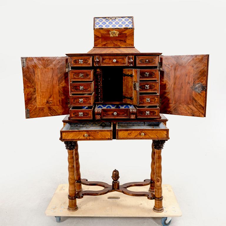 A first half of the 18th century walnut cabinet.