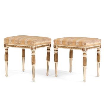 A pair of late Gustavian stools, early 19th century.